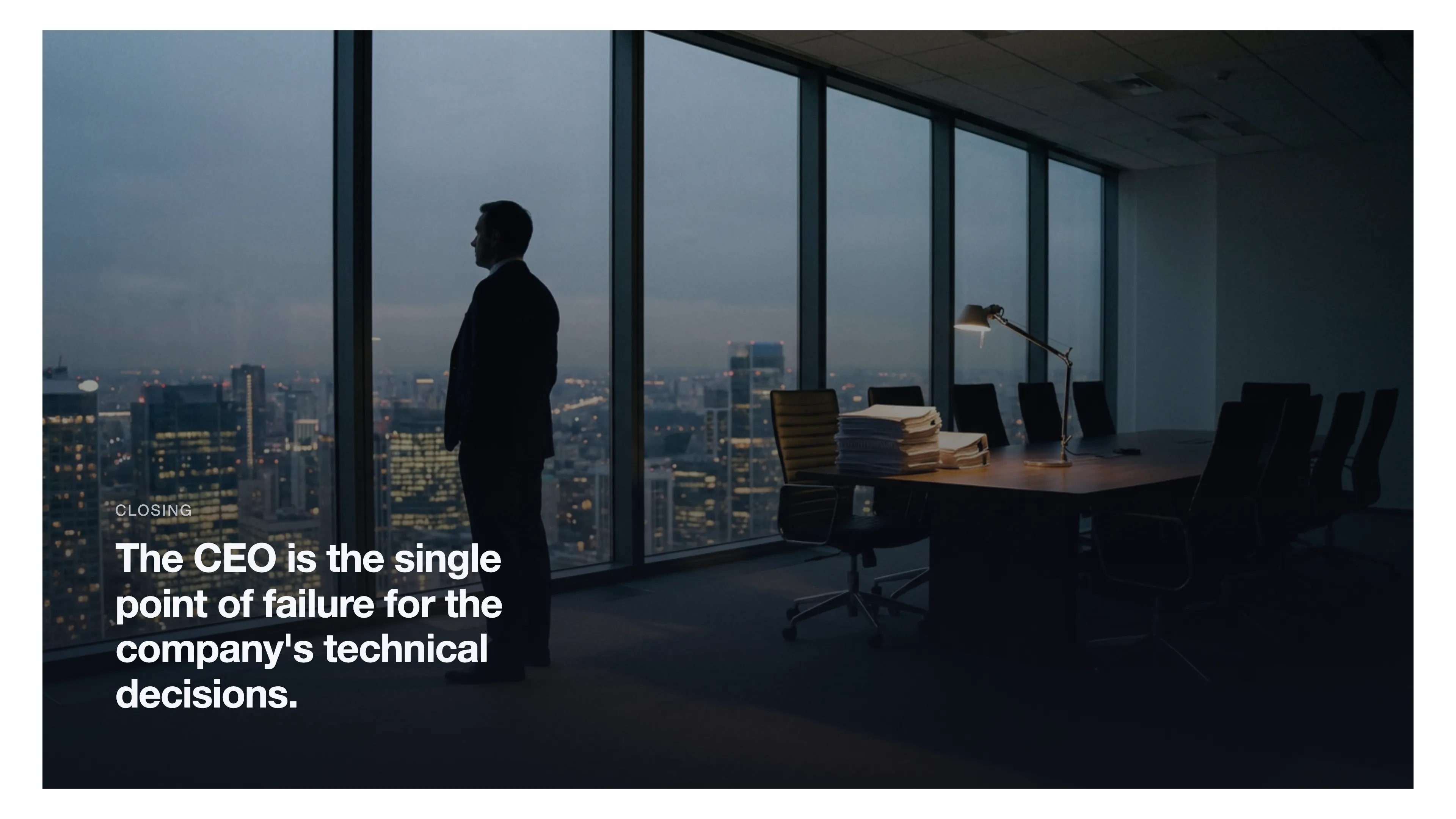 A lone CEO in a dim office, representing the burden of technical decisions